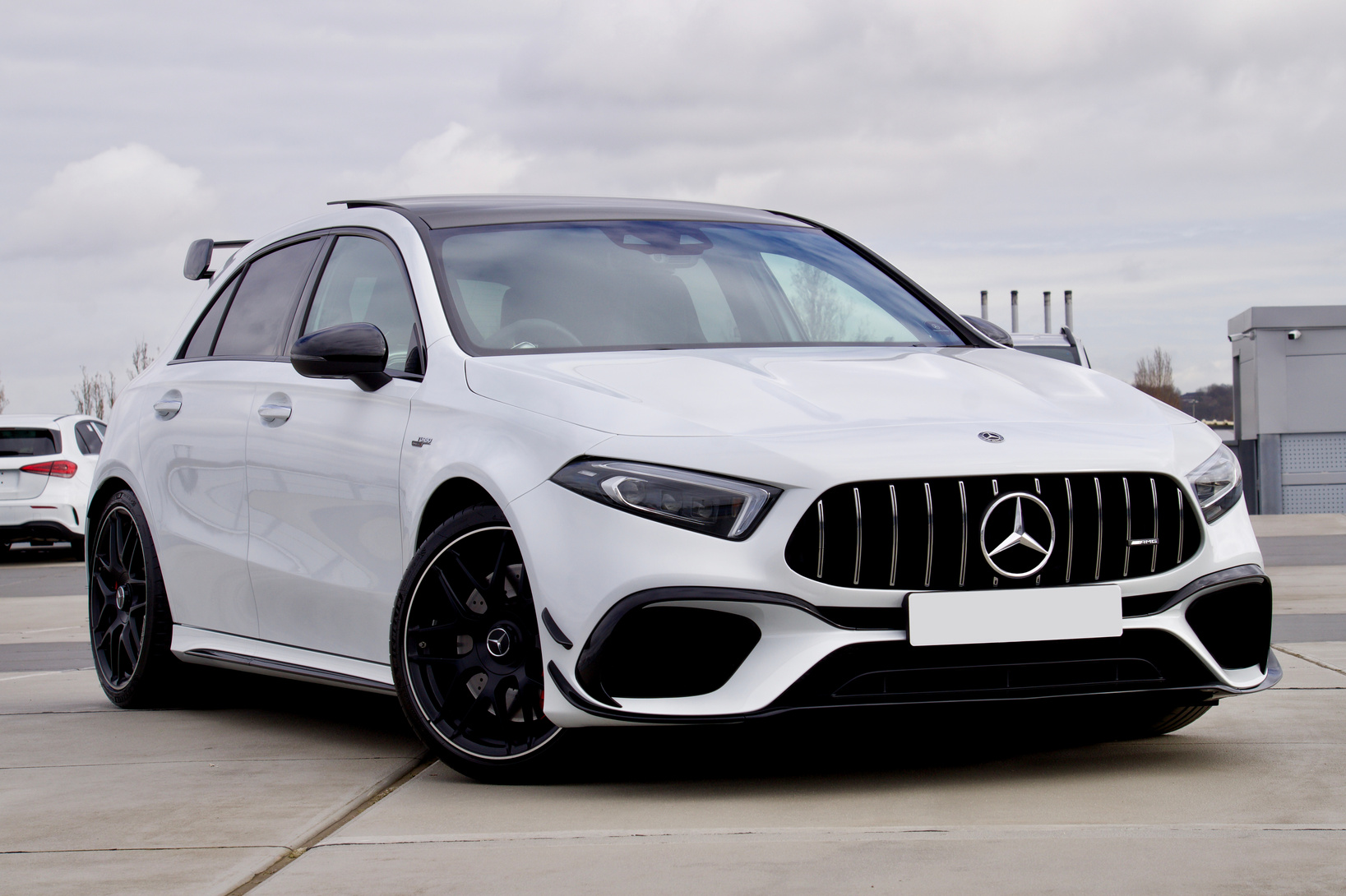 White Mercedes Benz Car Parked on the Road